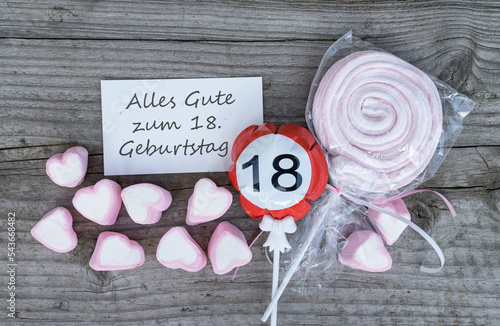 German greeting card with text: Happy 18th Birthday and pink marshmallows