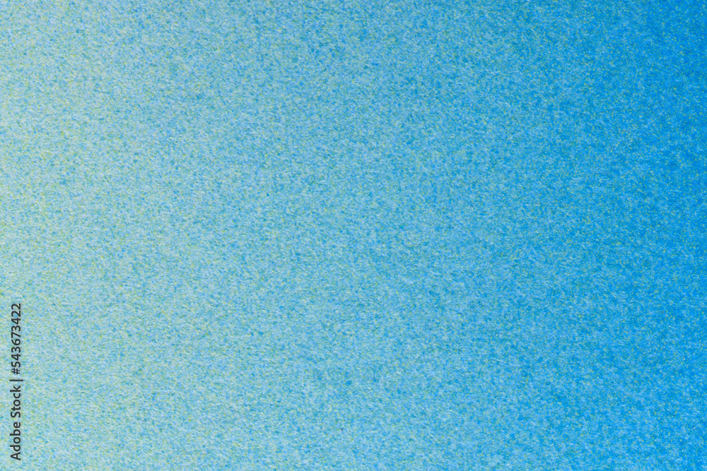 macro photography blue and yellow spray paint on white paper macro photography blue and yellow spray paint on white paper