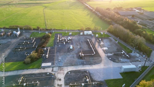 Aerial view sliding over National Grid energy supply pipes, UK. Metal pipes for the supply of energy to customers. Harrogate Pannal, North Yorkshire. photo