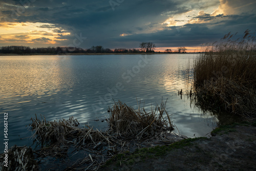 Fototapeta Naklejka Na Ścianę i Meble -  Evening view of the lake in eastern Poland
