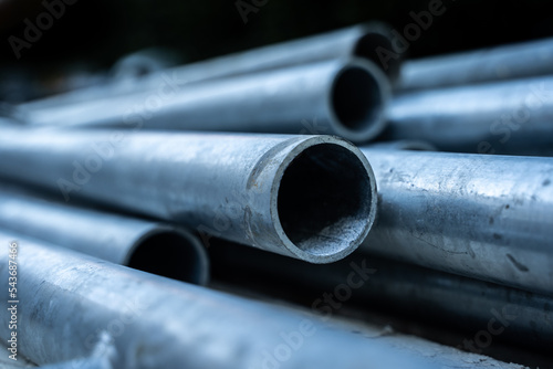 Construction site.  Workers.  House renovation with tools.  New house with new materials, stairs, sheets and house coat. Steel and iron. Tubes