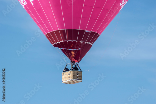 pink balloon flight in the blue sky