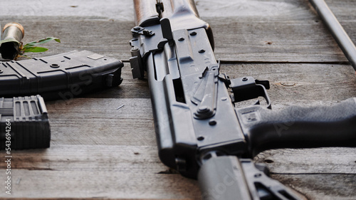 Modernized Kalashnikov assault rifle lies on the shooting range