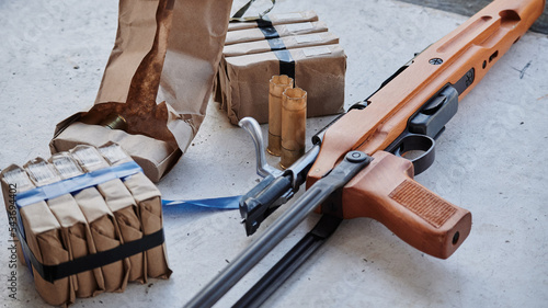 Old type weapons with packs of cartridges