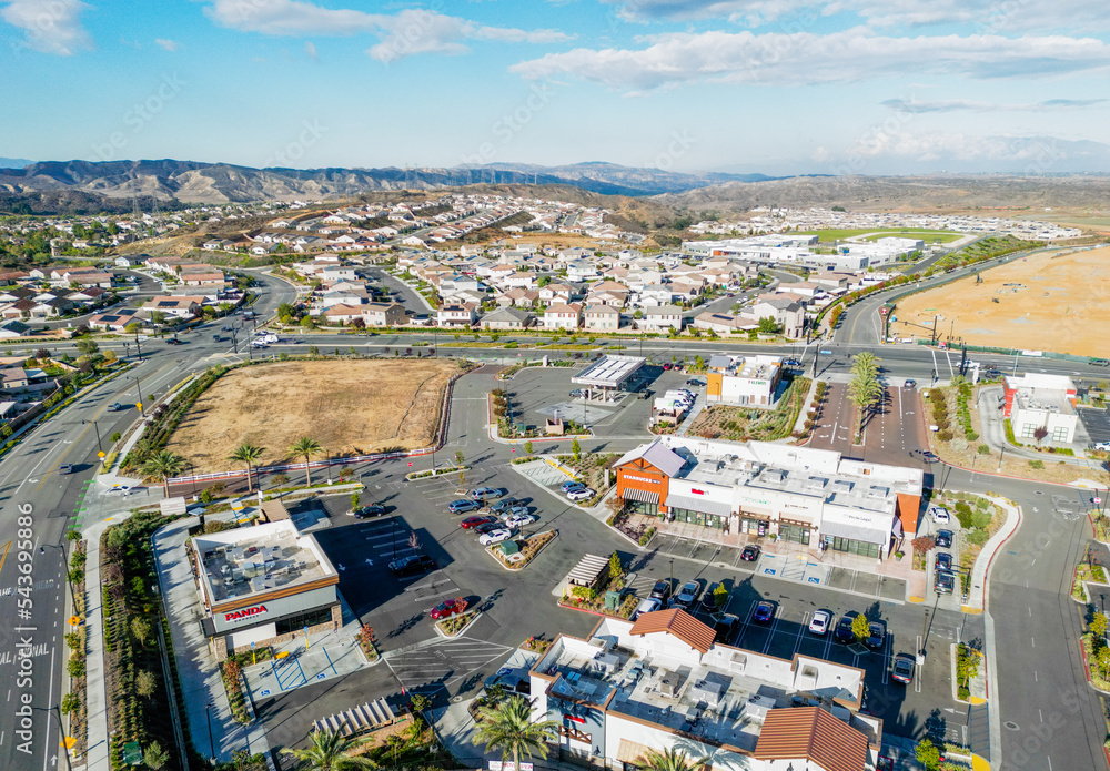 The City of Yucaipa, California, in Southern California, looking at a Shopping Center from the Air with a Drone
