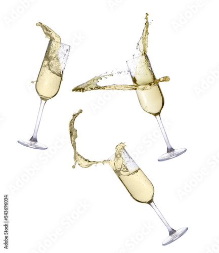 Glasses of champagne with splashes isolated on white background 