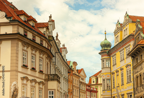 Buildings in historic old town section of Prague, Czech Republic. Red roofs and architecture with medieval embellishments are seen everywhere.