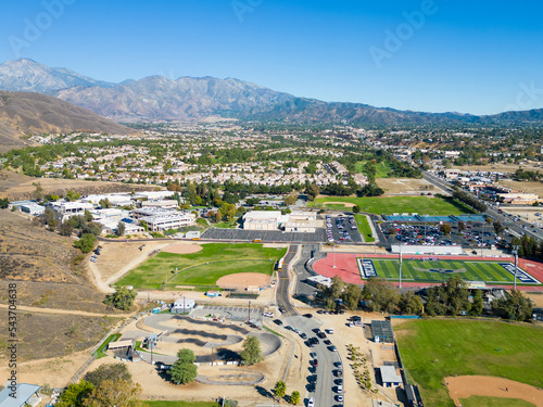 An Aerial View of The City of Yucaipa, California, in Southern California, looking at the Local High School and Surrounding Area photo