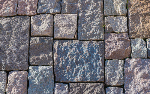 Porphyry floor texture. Architectural detail, closeup. Trentino porphyry detail useful as a background. Trentino Alto Adige, northern Italy photo