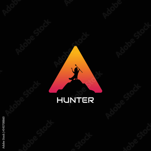 silhouette hunter logo. logo of an adventurer standing on a rock