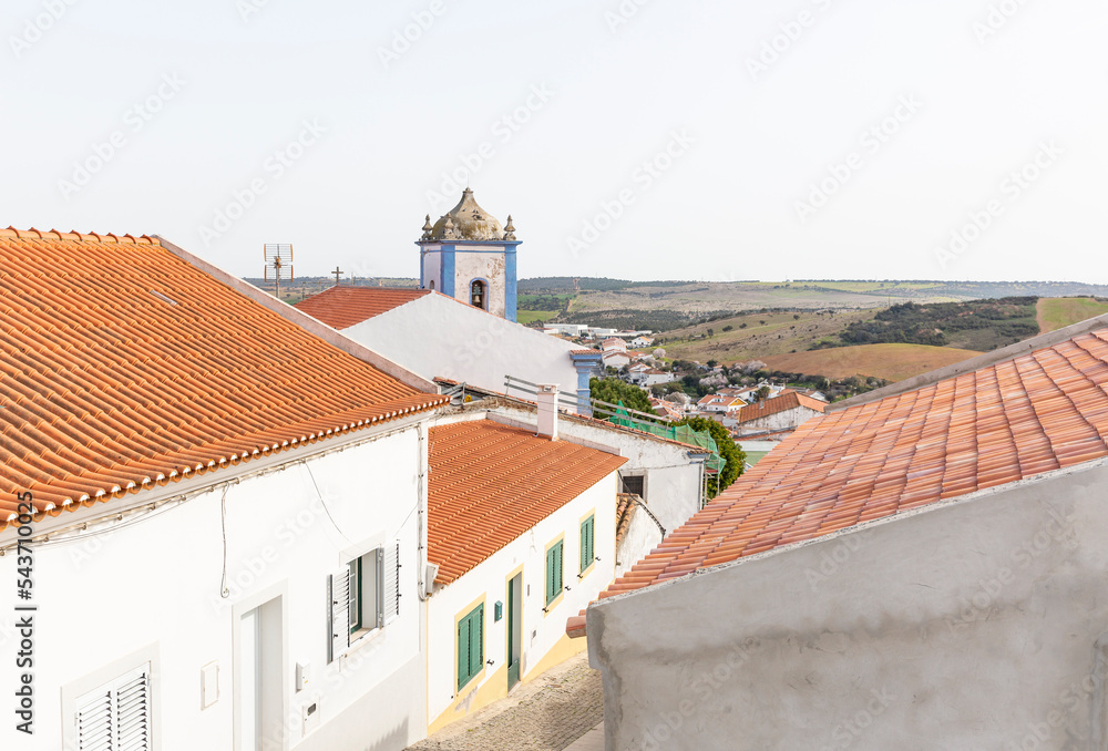 Obraz premium a view over Aljustrel and the bell tower of the Parish church, district of Beja, Alentejo, Portugal