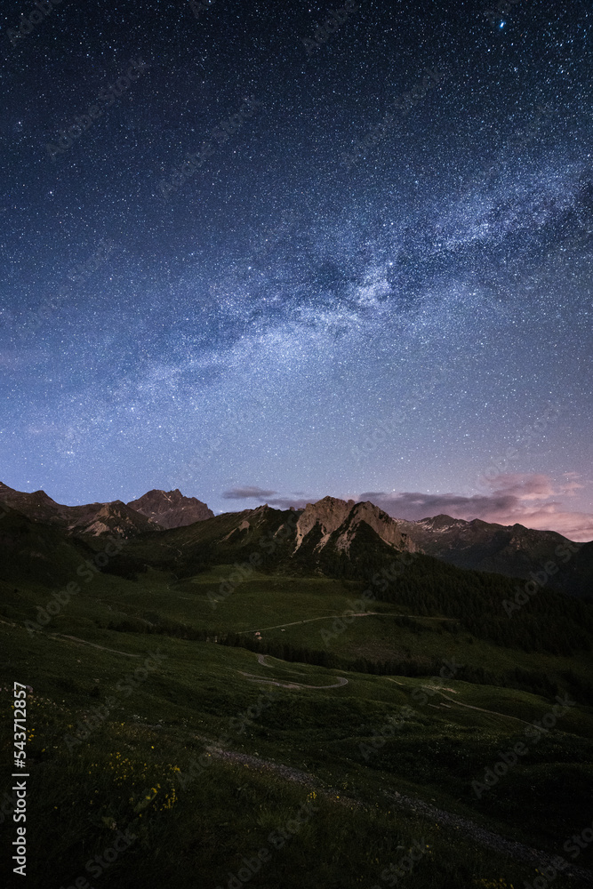 Milky Way and mountain range on top of a mountain pass, Northern Italy