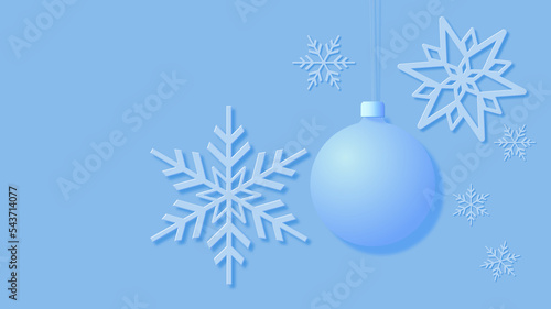 Christmas card showing snowflakes and a Christmas tree bauble on a blue background.