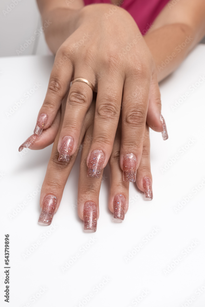 stylish female manicure , beautiful female hands on a white background stylish female manicure , beautiful female hands on a white background