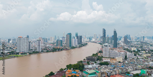 Photography Aerial view of Bangkok City skyline by Chao Phraya River in Thailand
