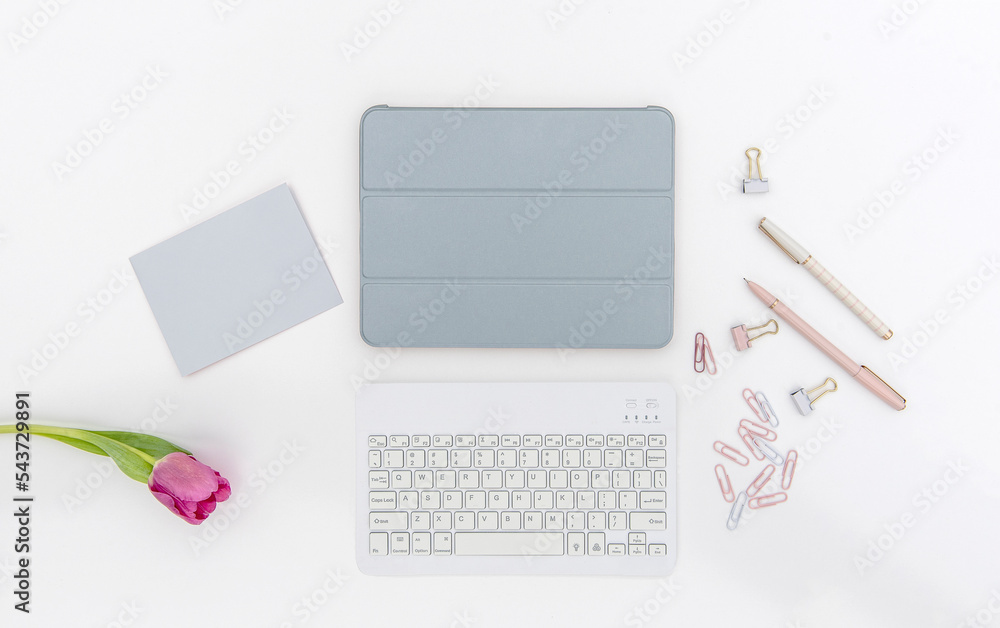 Flat Lay tablet on Desktop with office supplies Flat Lay tablet on Desktop with office supplies