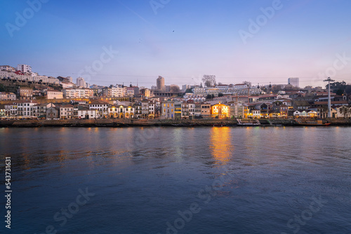 Vila Nova de Gaia skyline and Douro River at sunset - Porto, Portugal