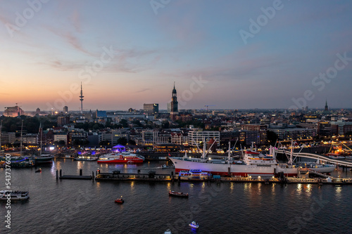 Panorama of the harbor from hamburg with a cruise ship photo