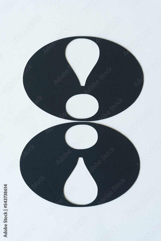exclamation marks cut from black paper ovals exclamation marks cut from black paper ovals
