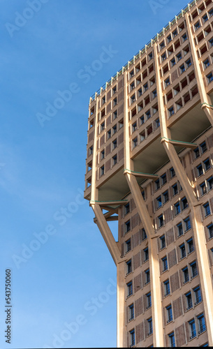 Torre Velasca, skyscraper built in the 1950s by the BBPR architectural partnership, seen from below, in Milan city center, Lombardy region, Italy photo