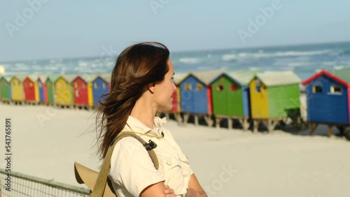Colorful bathhouses at Muizenberg, Cape Town, South Africa. Beach infrastructure. Beach infrastructure. Row of colorful locker rooms. colorful wooden dressing colorful locker rooms on the beach photo