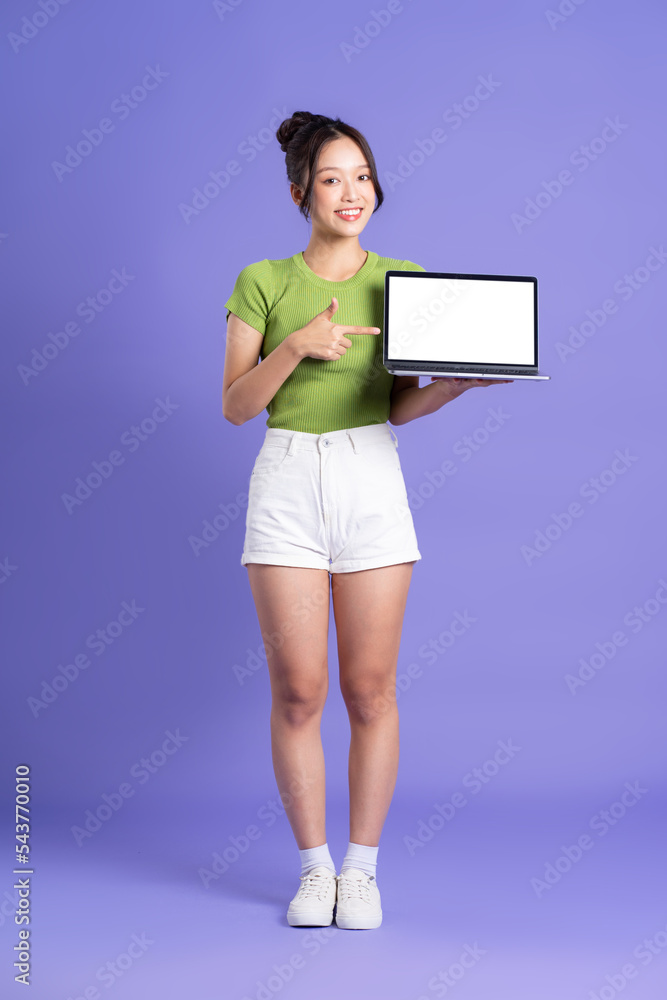 full body image of beautiful asian girl posing on pink background full body image of beautiful asian girl posing on pink background
