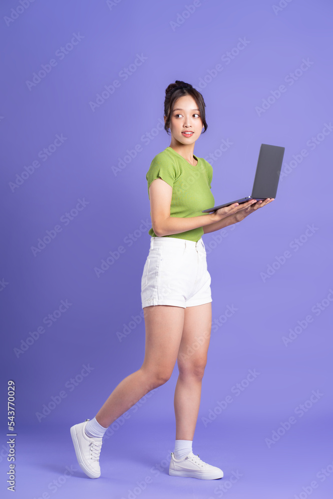 full body image of beautiful asian girl posing on pink background full body image of beautiful asian girl posing on pink background