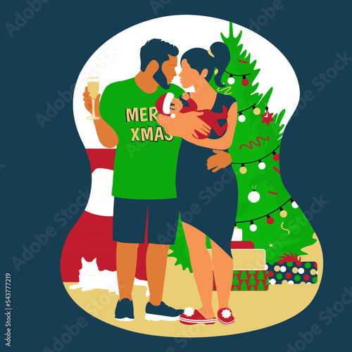 Happy young family celebrate christmas holidays. New year and merry christmas party at home. Husband and wife together with baby. Green tree background. Isolated on dark.