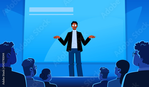 Presentation of a new product or business lecture. Man performs on stage in front of an audience in the hall. Conference or seminar