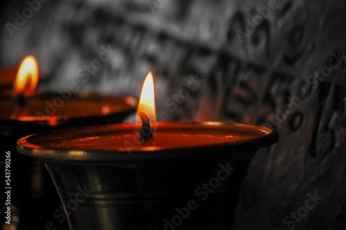 Closeup of ritual candles in a temple photo