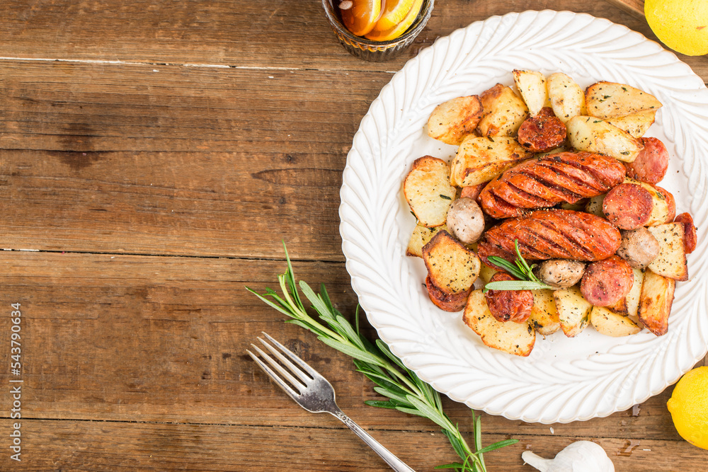 A plate of delicious potatoes and baked sausage
