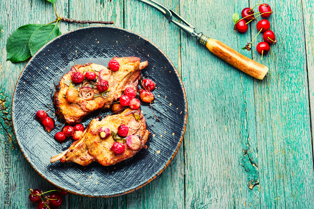 Meat on the bone roasted in berry sauce. Meat on the bone roasted in berry sauce.
