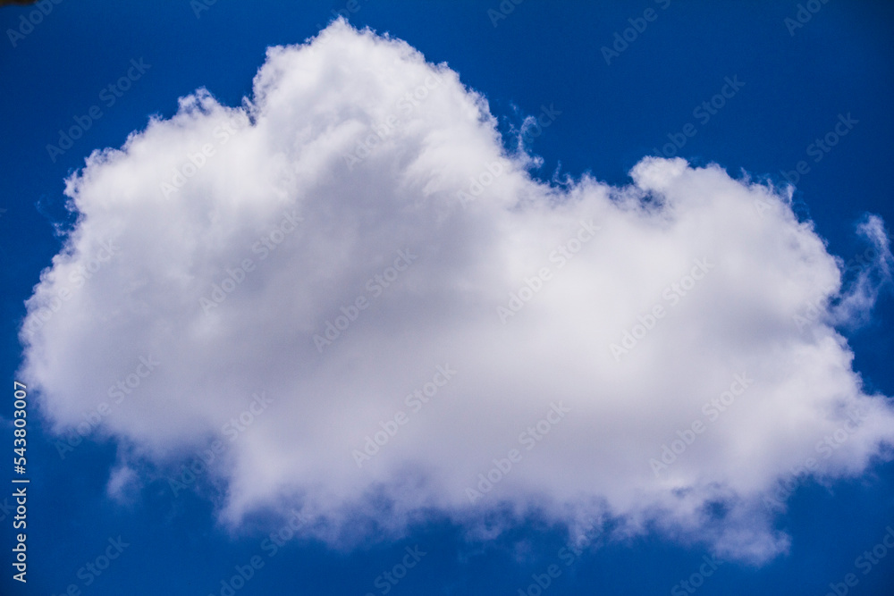 Obraz premium Blue Sky with Fluffy White Clouds