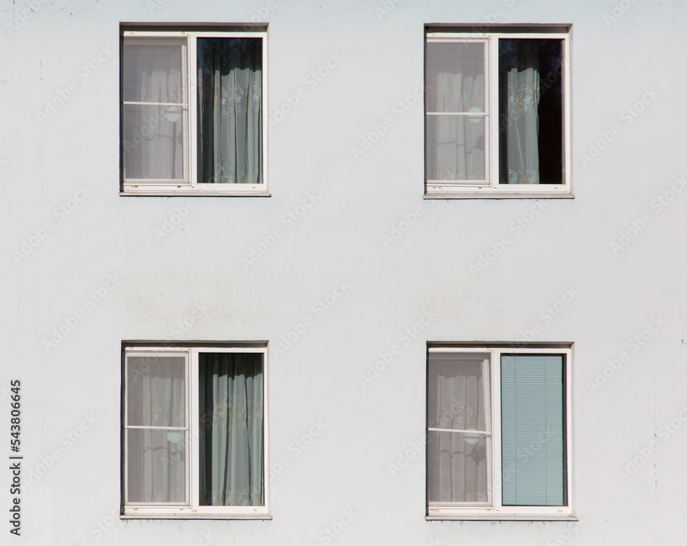 Windows in a white multi-storey building