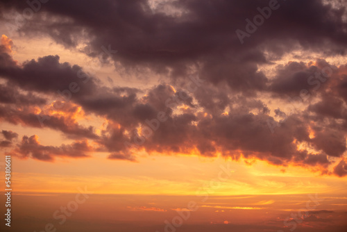 Colorful clouds at sunset as background. © schankz