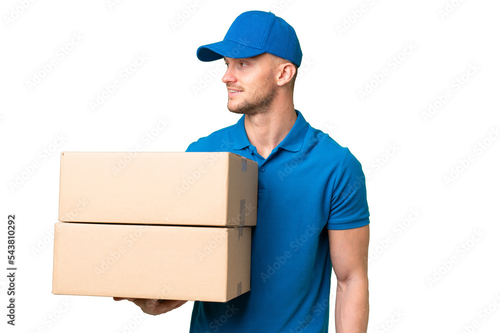 Delivery caucasian man over isolated background looking side Delivery caucasian man over isolated background looking side