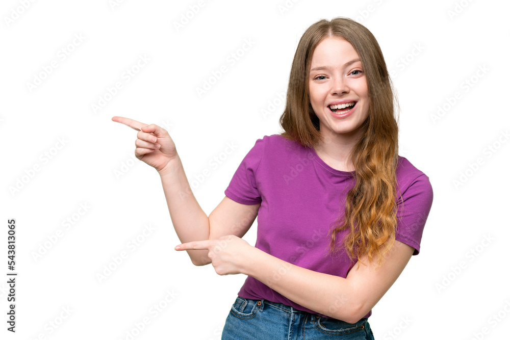 Young pretty woman over isolated background surprised and pointing side Young pretty woman over isolated background surprised and pointing side