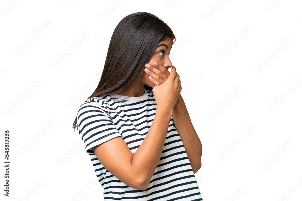 Young African american woman over isolated background covering mouth and looking to the side Young African american woman over isolated background covering mouth and looking to the side