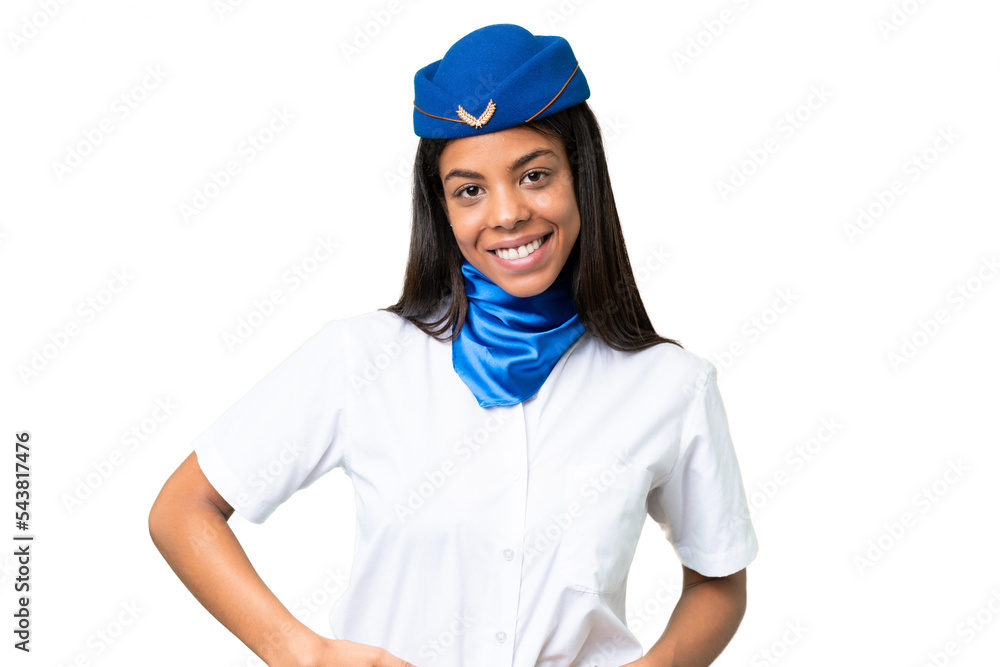 Airplane stewardess African american woman over isolated background posing with arms at hip and smiling Airplane stewardess African american woman over isolated background posing with arms at hip and smiling