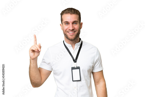 Young caucasian man with ID card isolated on green chroma background pointing up a great idea © luismolinero