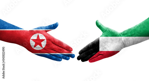 Handshake between Kuwait and North Korea flags painted on hands, isolated transparent image.