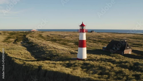 Sylt, Lighthouse Ellenbogen, Northernmost point of Germany. Schleswig-Holstein, North Sea. 4K drone. Beautiful tourist destination and attraction from above. photo