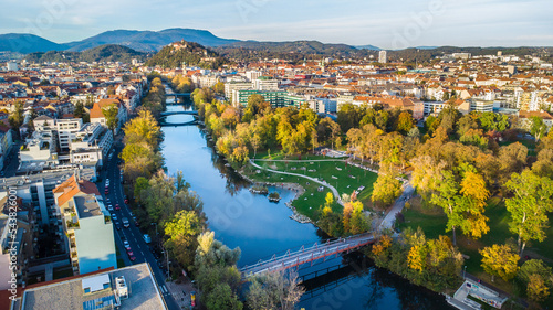Aerial view of the city of Graz during autumn with the beautiful river Mur