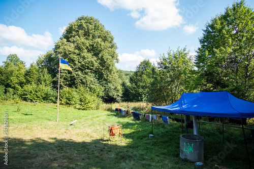 Fototapeta Naklejka Na Ścianę i Meble -  flag of ukraine - yellow-blue in a tourist camp