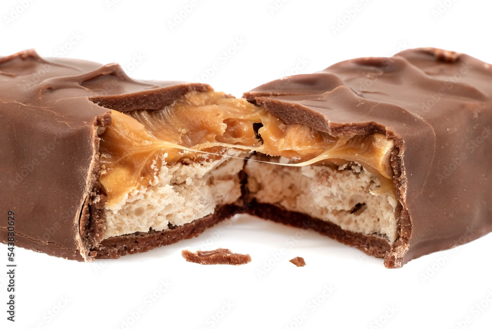 Chocolate bar with nougat on a white background. The bar is broken into two parts isolate Chocolate bar with nougat on a white background. The bar is broken into two parts isolate
