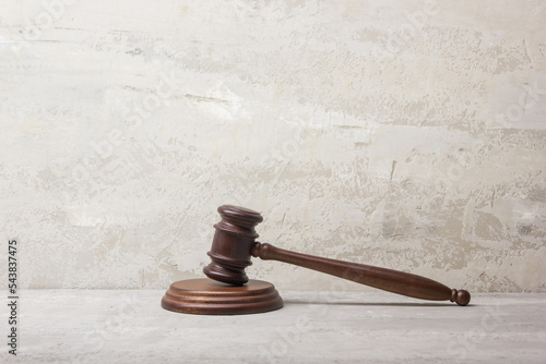 Law and justice concept. Mallet gavel of the judge, scales of justice, books. Copy space for text