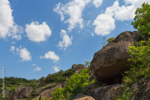 Large smooth stones on the bottom Arbuzynsky canyon near the Trykraty village, on the Arbuzynka river in the Voznesenskyi region of Mykolaiv Oblast of Ukraine