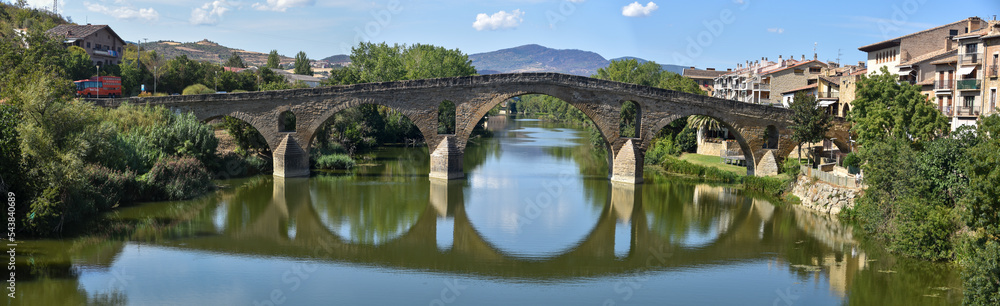 Puente la Reina, Spain - 31 Aug, 2022: Arches of the roman Puente la Reina foot bridge, Navarre, Spain