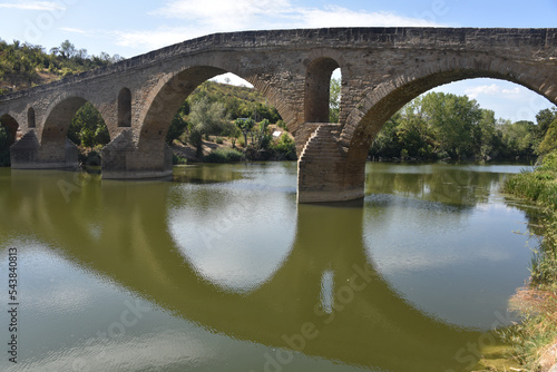 Puente la Reina, Spain - 31 Aug, 2022: Arches of the roman Puente la Reina foot bridge, Navarre, Spain © Mark