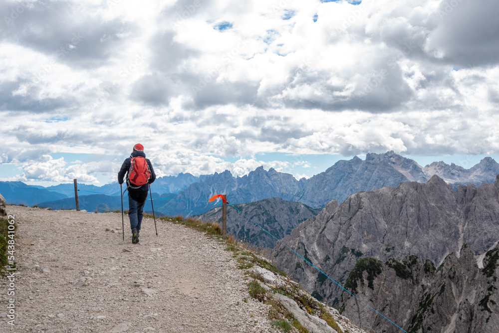 Hiking with a dog around the scenic 3 Zinnen mountains in the Dolomites in South Tyrol Hiking with a dog around the scenic 3 Zinnen mountains in the Dolomites in South Tyrol